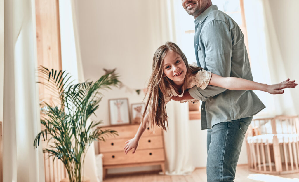 father and daughter at home
